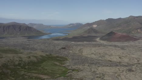 Famous-solidified-lava-terrain-of-Iceland-seen-from-above-on-sunny-day,-aerial