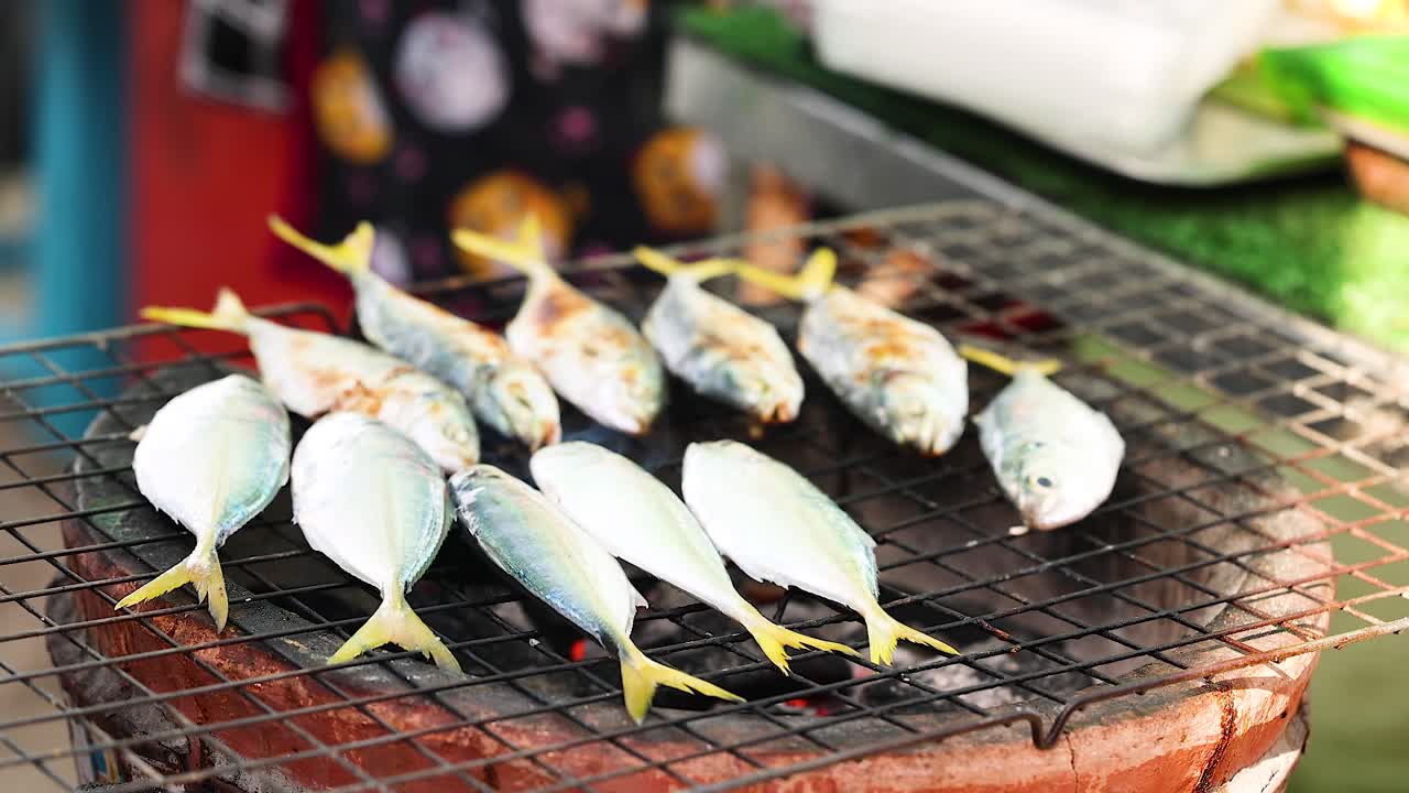 Mackerel grilling on a barbecue in Chonburi, Thailand