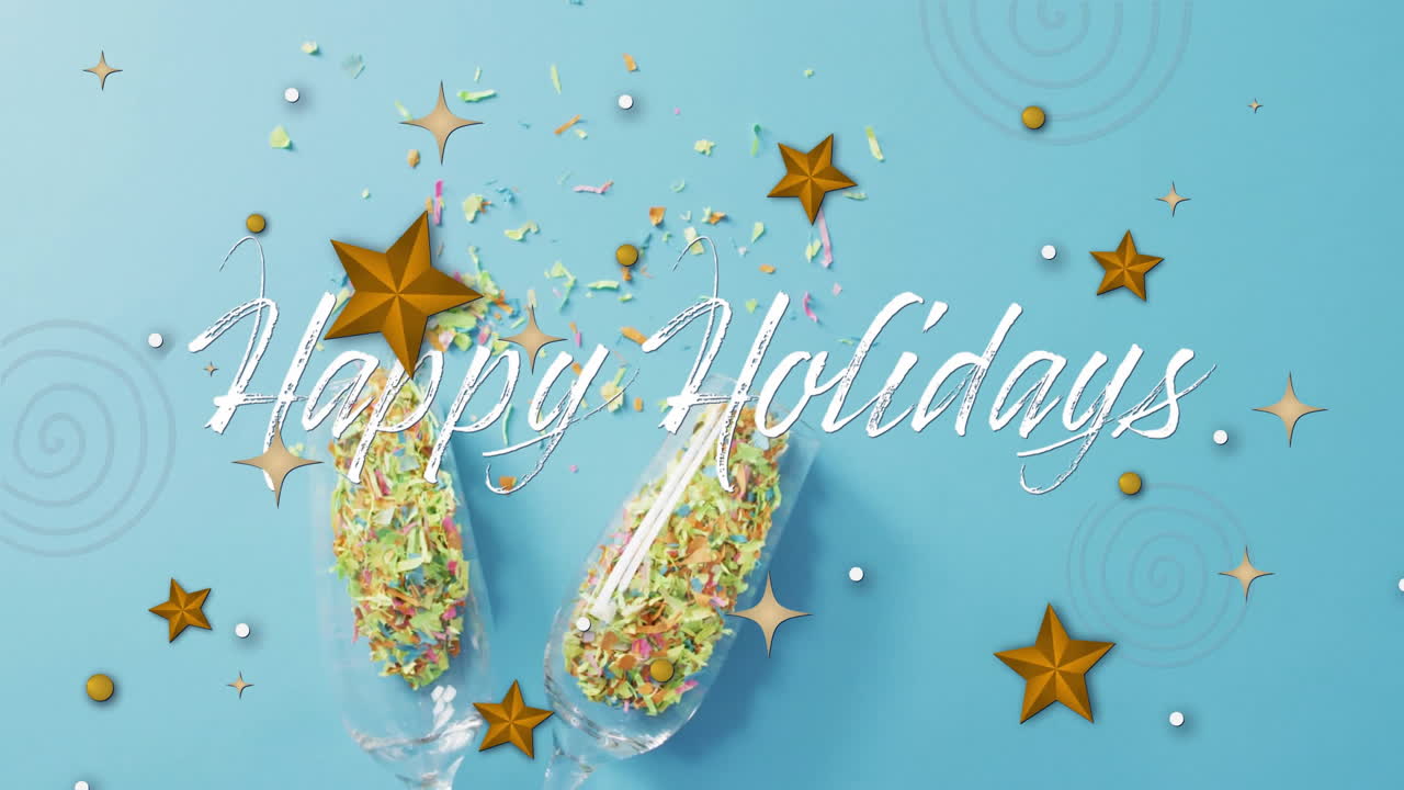 Animation of happy holidays text over christmas decorations and champagne glasses