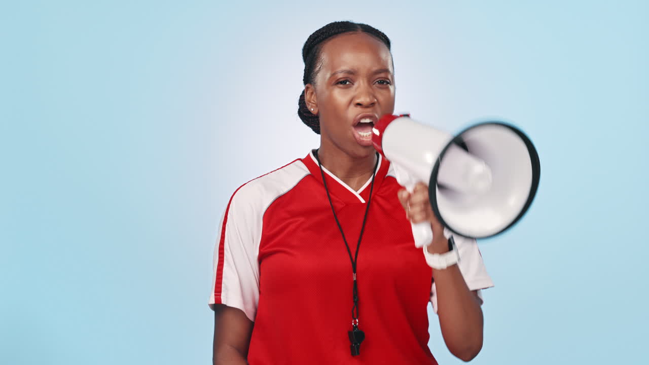 Red card, megaphone and woman athlete in studio