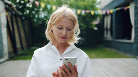woman using a smartphone outdoors