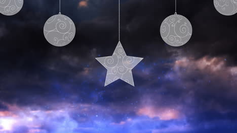 animación de decoraciones navideñas sobre fuegos artificiales en fondo oscuro