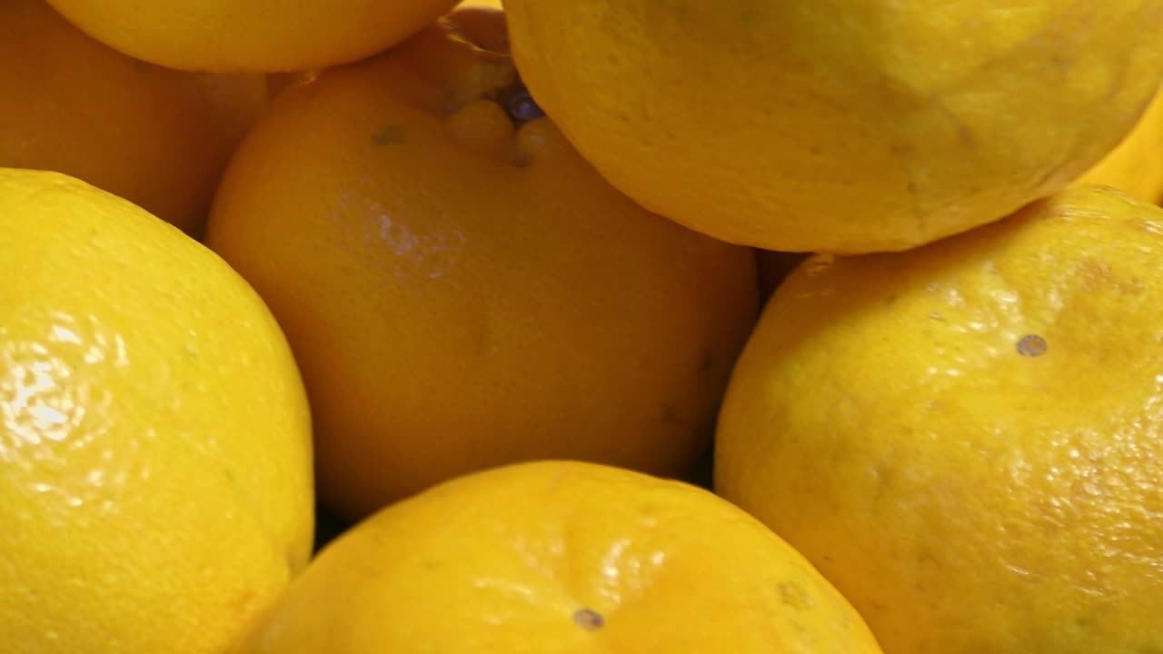 Fresh Oranges stacked on each other