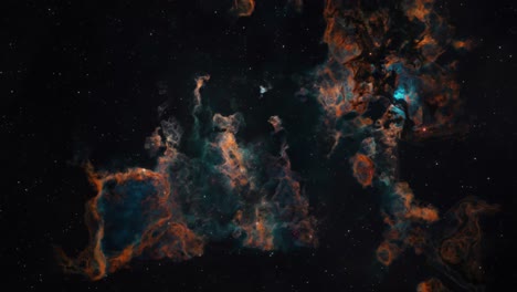 long shot of a beautiful brown and green gaseous nebula in deep space