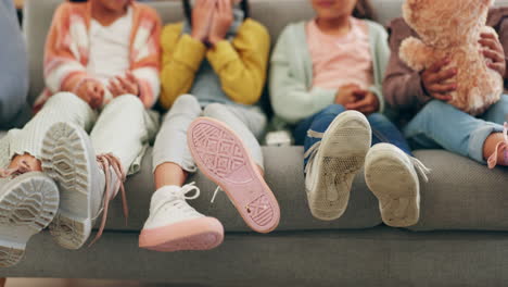 friends, feet and children watching tv