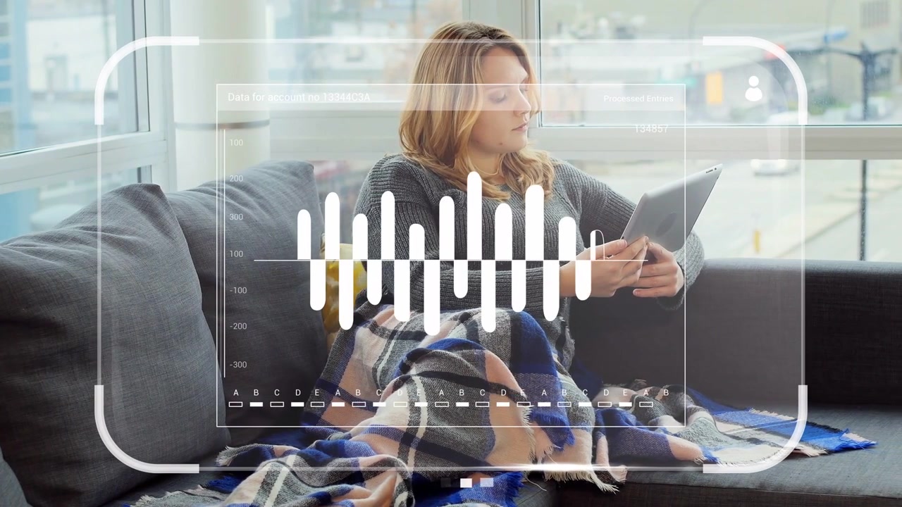 Woman sitting on sofa, holding tablet and adjusting angle, HUD overlay pulsing, reviewing tech data