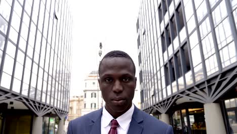 confident black african business man in the street