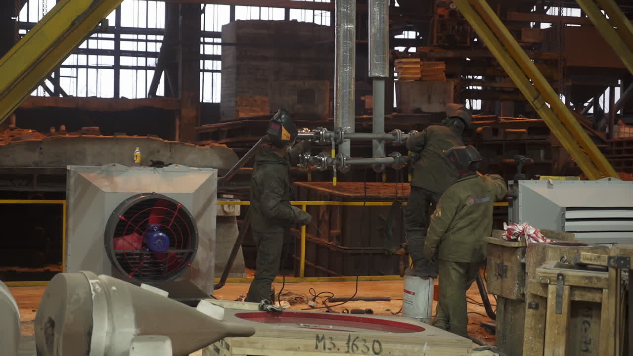 Metal Foundry Workers in Action