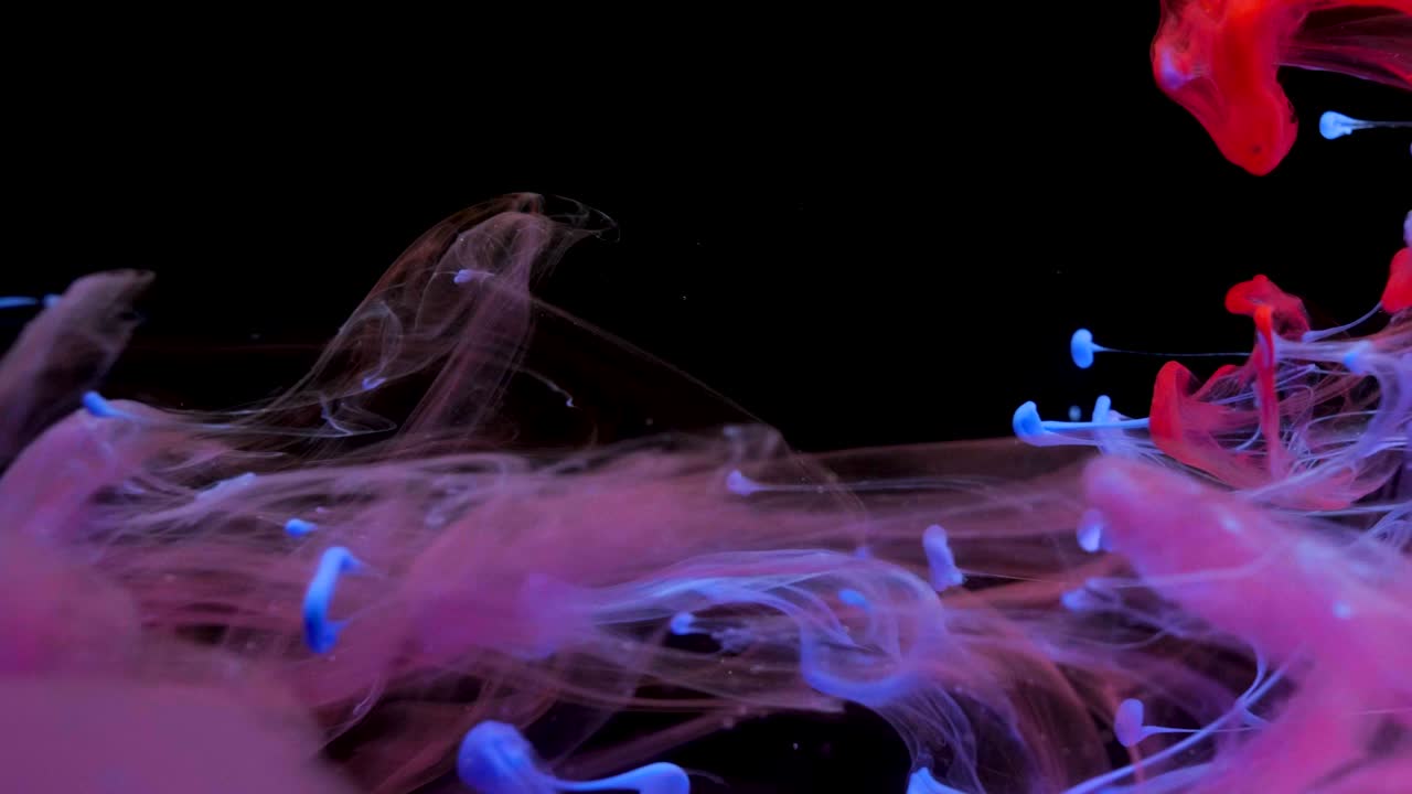 Colorful ink paint background in the water, ink flow underwater