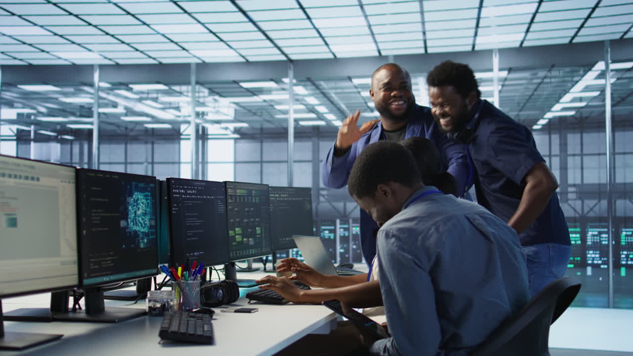 Diverse Tech Team Celebrates Success in Data Center