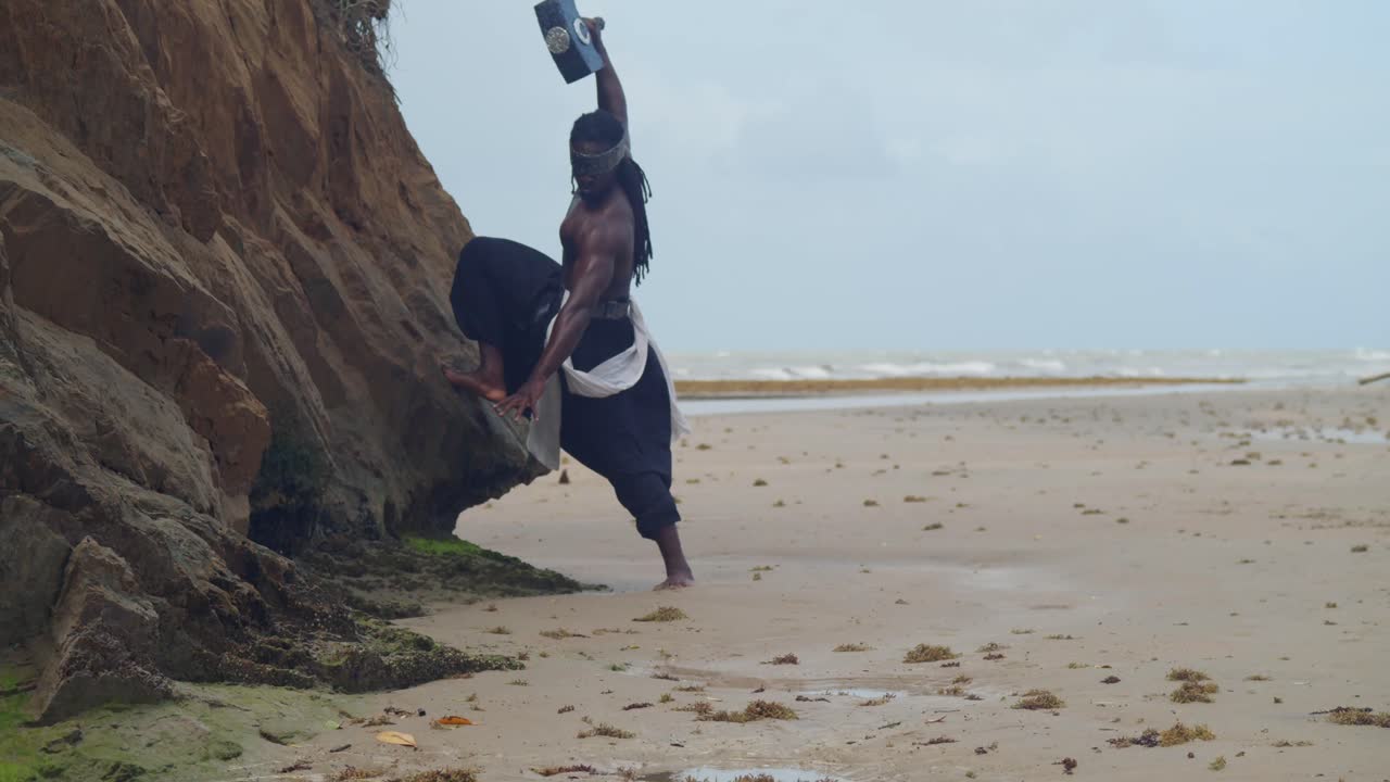 A muscular, dark-skinned man, embodying Nekharis in perfect cosplay, enjoys the tropical beach setting