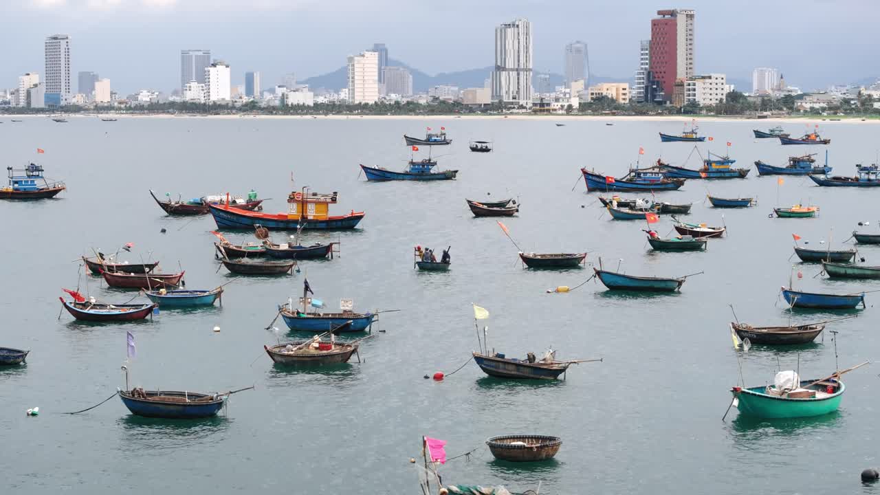 Fishermen paddle out in traditional basket boat