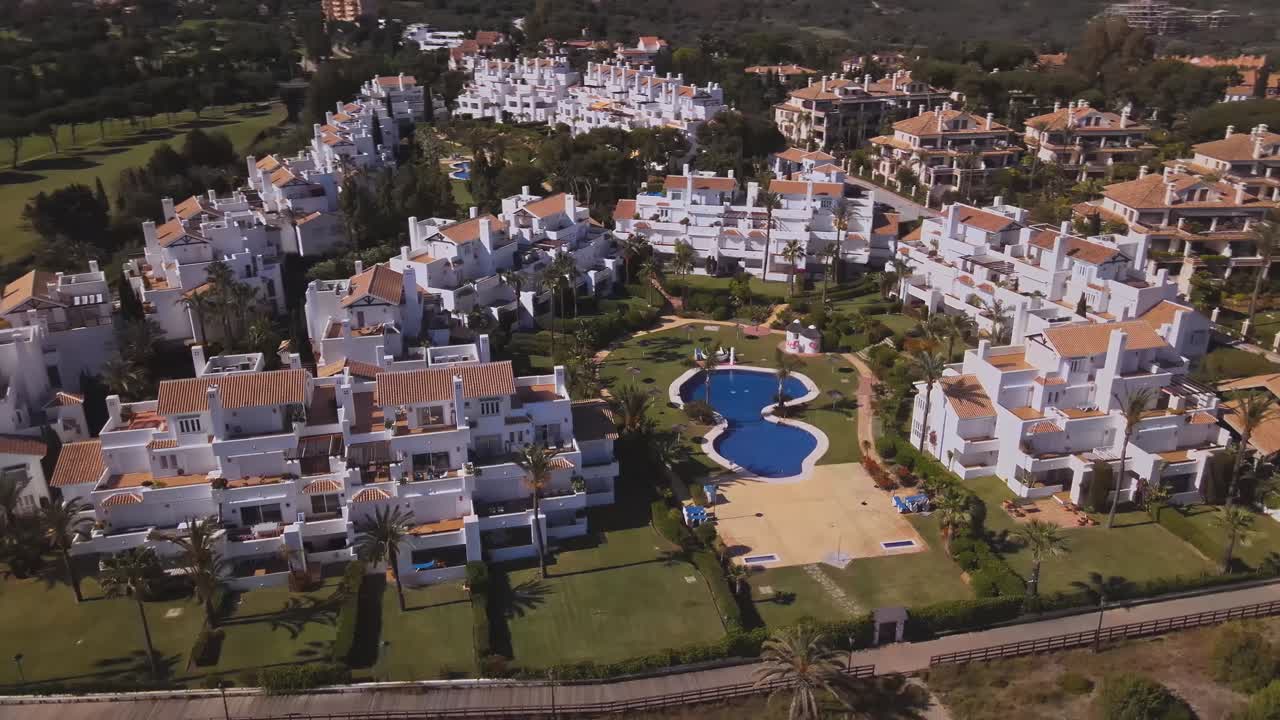 Aerial view of residential buildings panning to the right