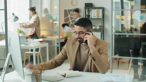 time lapse of middle eastern businessman working in office