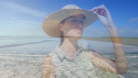 mujer con un sombrero de paja en la playa 4k