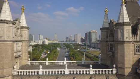 Aerial-flyover:-Replica-London-Tower-Bridge-built-in-Suzhou,-China