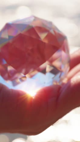 crystal ball held in hand