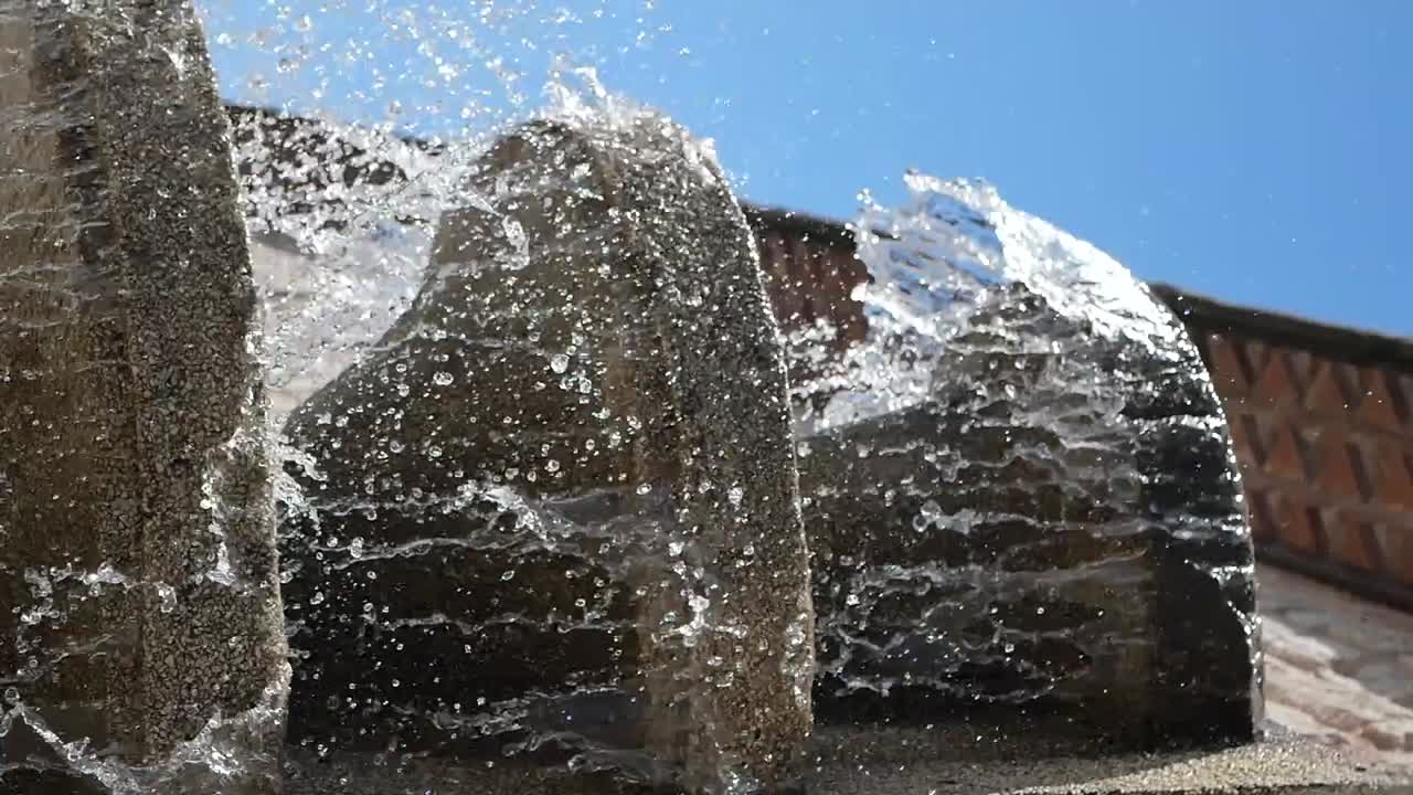 Water Splashes from Stone Fountain