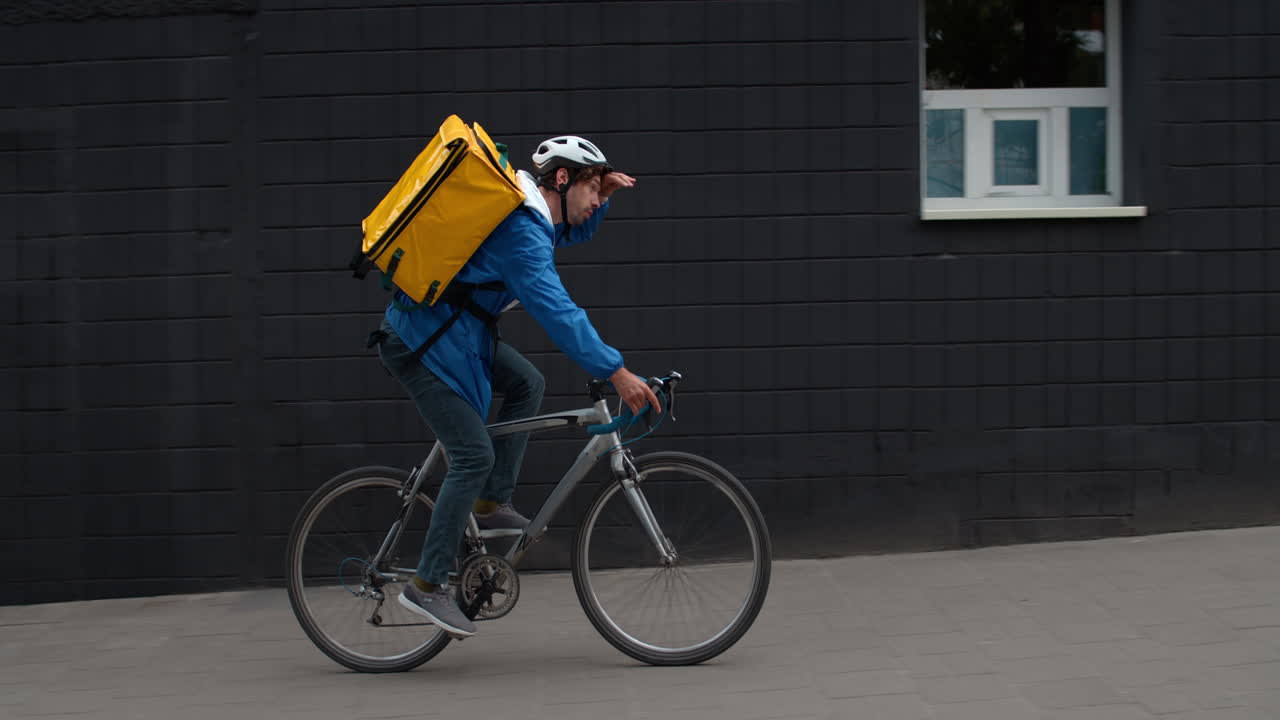 Food delivery courier on bicycle