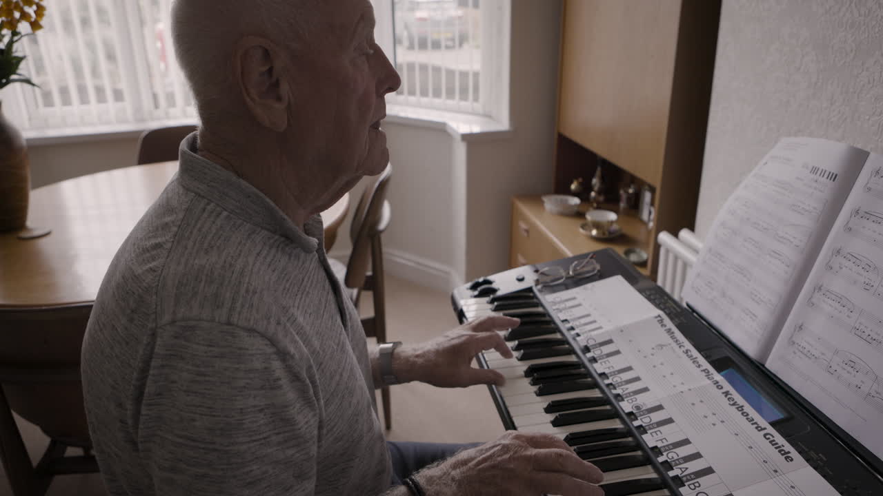 Elderly man playing the piano