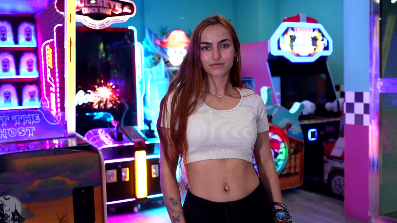 A woman in an arcade