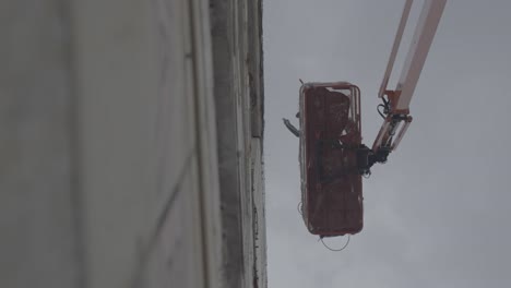 workers are working on the building