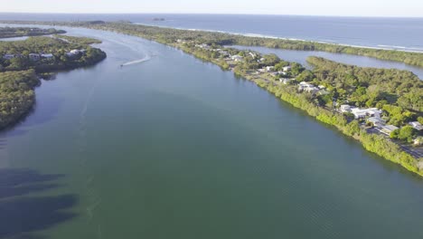 aerial view of tweed river on a sunny day in chinderah, northern nsw, australia