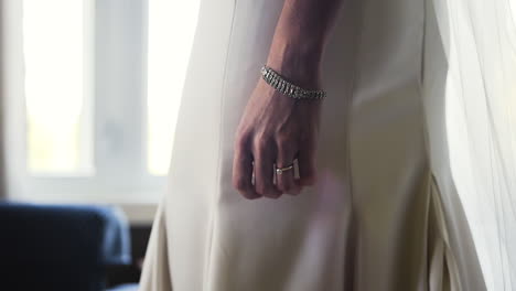 close up of a beautiful bride’s hand wearing a ring