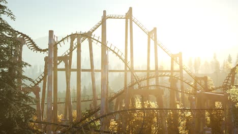 old roller coaster at sunset
