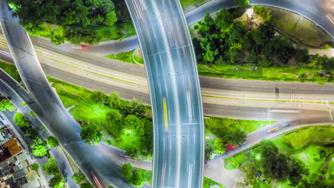 Aerial-time-lapse-on-a-highway-at-night