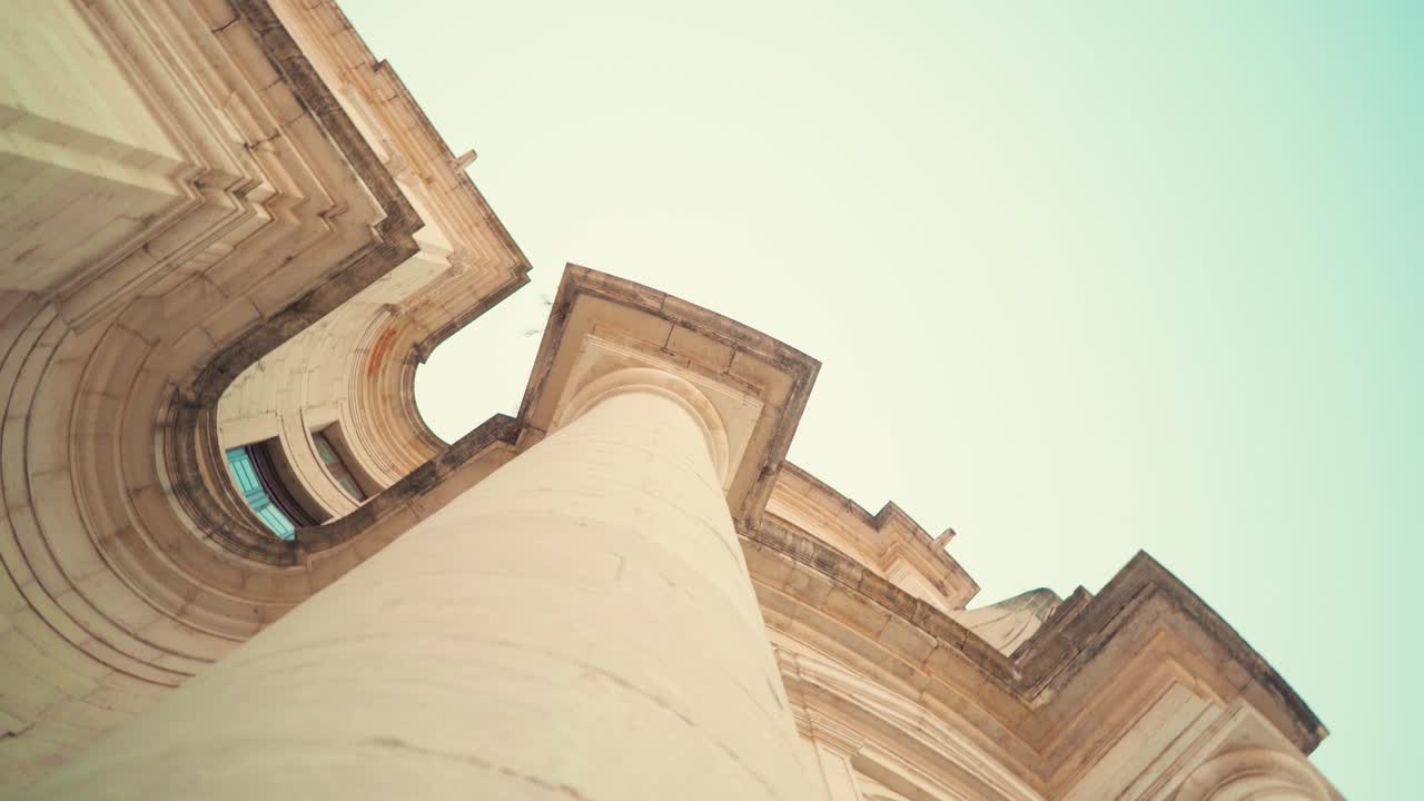 Lisbon ancient baroque cathedral National Pantheon facade column and statue detail at sunrise 4K