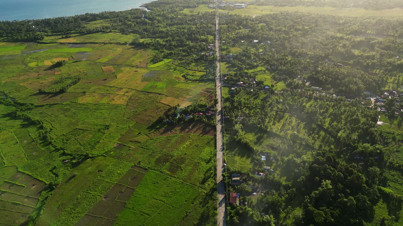 Panoramic Aerial View Of A Road Through Agricultural Lands In Timbaan In San Andres, Province Of Catanduanes, Philippines.