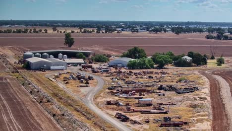 aerial view of a rural farm and industrial scrap yard