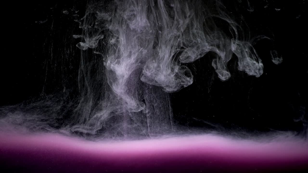 Paints. Abstract forms. Shooting on a black background