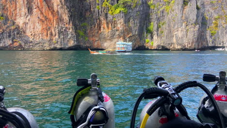 Dive-equipment-prepared-on-boat-for-diving-in-tropical-sea-location