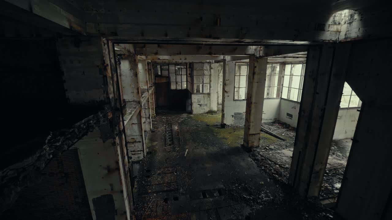 Wide Shot of a Dark and Dilapidated Abandoned Building Interior