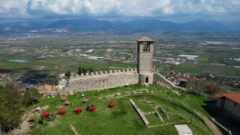 albanian medieval fortress in preza: towering stone walls encircling castle atop hill - a historical architectural marvel