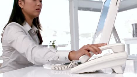 Businesswoman-feeling-stressed-at-her-desk