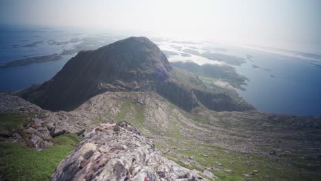 amazing view from the top of donnamannen mountain - panning shot