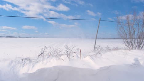 fast winds sweeping over snow drifts in the middle of winter