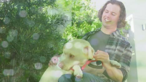 spot of light against caucasian handicapped man on wheelchair playing with his dog