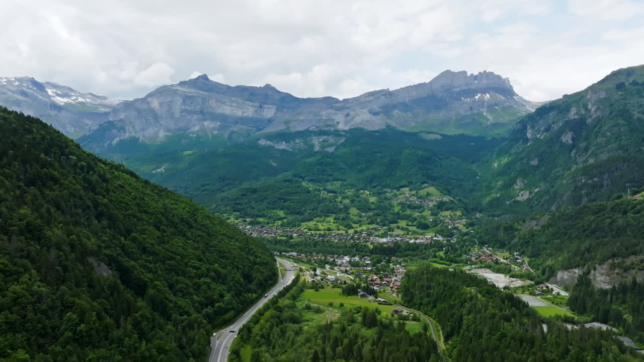 Scenic Mountain Valley with Road and Village