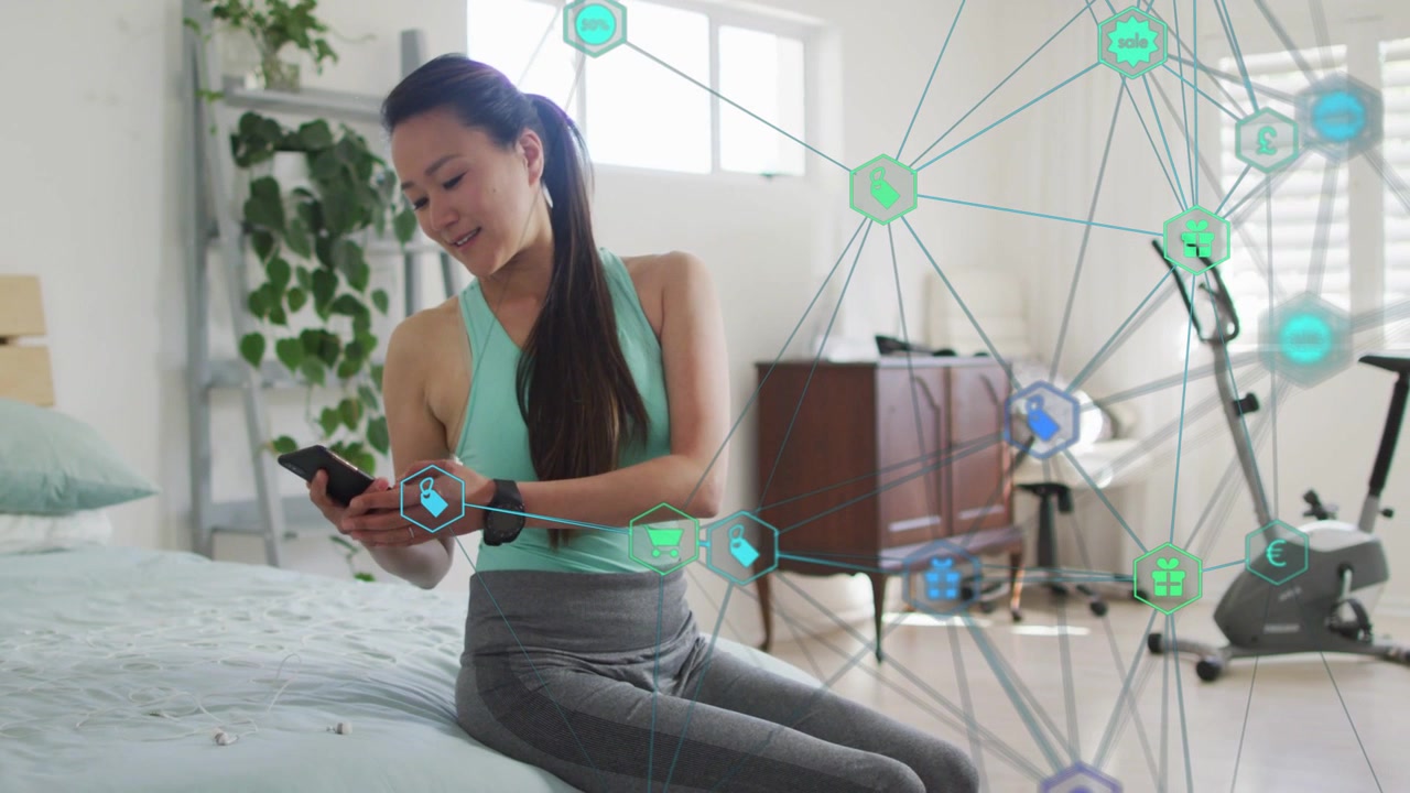 女性が電話に手を伸ばし、掴んでタップする。ネットワークオーバーレイが起動し、フィットネス統計を確認している。