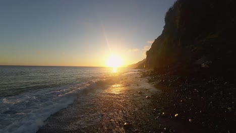 Drone-shot-sunset-Ponta-do-Sol,-Madeira-island,-Portugal