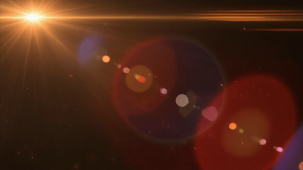Bright Golden Lens Flare with Bokeh Effect on Dark Background