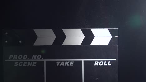 clapperboard on a black background