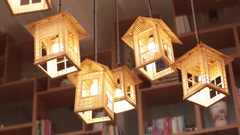 close up footage of handcrafted hanging lamp made from wood