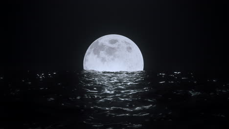 loop full moon at night on floats in black water