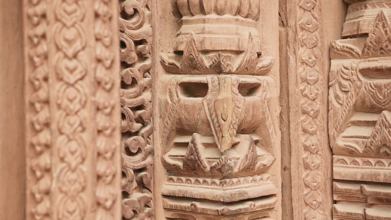 Intricate Wood Carving in Kathmandu, Carved Wooden Architectural Details in Amazing Elaborate Figures Carved into Wood in the Door of a Temple in Durbar Square in Nepal