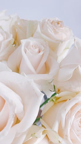 close up of a bouquet of cream roses